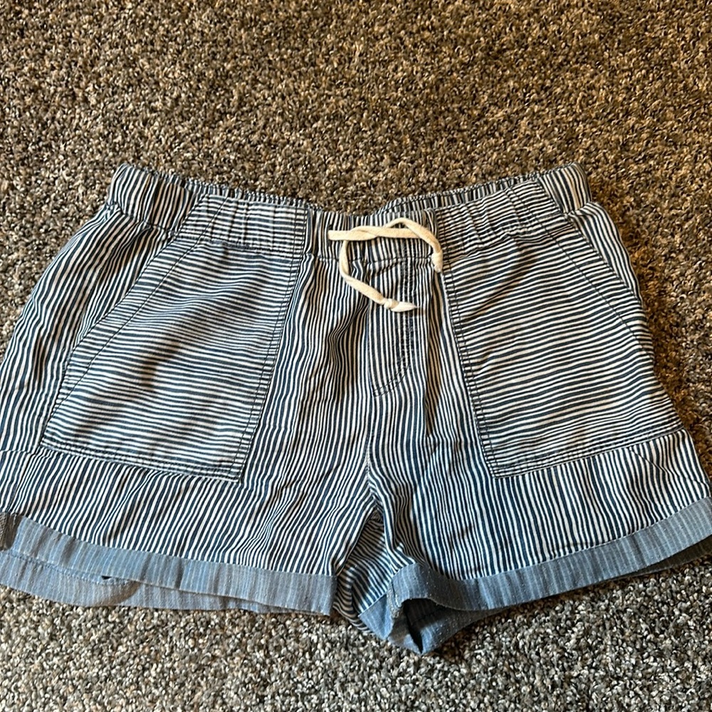 Blue and White Striped drawstring shorts.